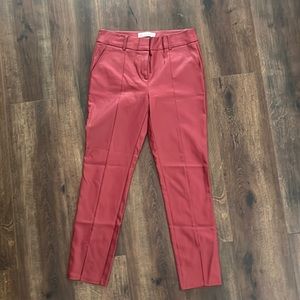 Leather Like Cigarette Pants with slit leg.